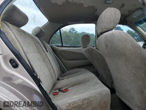 ✅ 1999 Toyota Corolla LE • VIN: 1NXBR12E6XZ148570 • Лот: 81554415. Опубликован ранее на Copart с пробегом 264 960 миль. Бесплатный доступ к архиву аукционных продаж из США и подробный отчёт об истории автомобиля на DreamBid. Изображение 10.