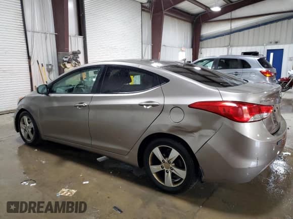 2013 Hyundai Elantra Limited with VIN 5NPDH4AE1DH186037, listed as a Copart auction lot 89881815 with 228,802 mi miles and Salvage title. Bid and sale history available at DreamBid. Image 2.