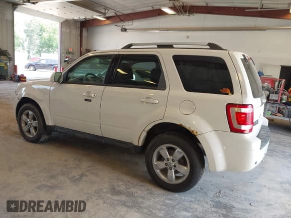 ✅ 2009 Ford Escape Limited • VIN: 1FMCU04729KA02595 • Lot: 42957550. Listed on IAAI with 156,567 mi. Free auction sales archive from the USA and detailed vehicle history report at DreamBid. Image 3.
