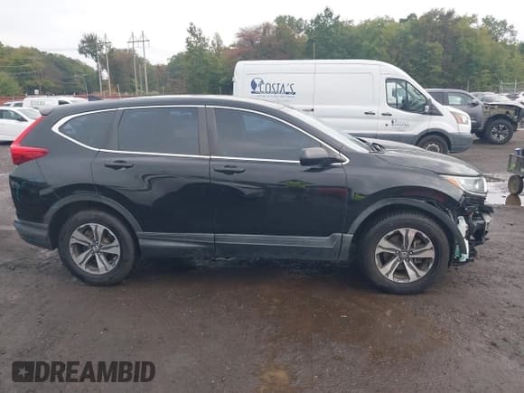 ✅ 2019 Honda CR-V LX • VIN: 2HKRW6H30KH216122 • Lot: 43297348. Listed on IAAI with 54,951 mi. Free auction sales archive from the USA and detailed vehicle history report at DreamBid. Image 13.