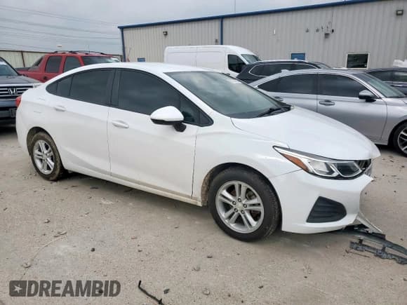 ✅ 2019 Chevrolet Cruze LS • VIN: 1G1BC5SM6K7123320 • Lot: 57381895. Listed on Copart with 111,805 mi. Free auction sales archive from the USA and detailed vehicle history report at DreamBid. Image 4.