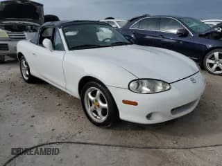 ✅ 2002 Mazda MX-5 Miata Cloth • VIN: JM1NB353X20222049 • Lot: 75404914. Listed on Copart with Not provided. Free auction sales archive from the USA and detailed vehicle history report at DreamBid. Image 4.