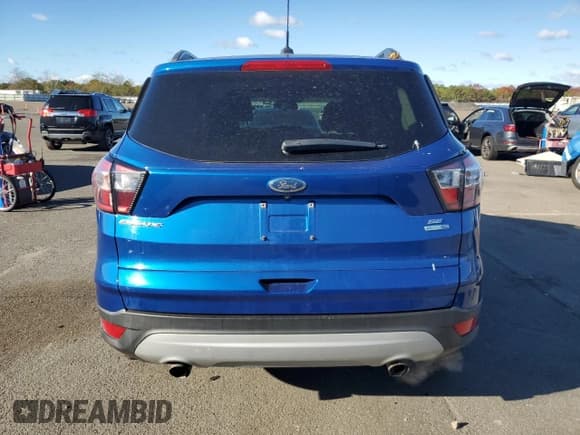 ✅ 2017 Ford Escape SE • VIN: 1FMCU9GD9HUE83194 • Lot: 91211475. Listed on Copart with 115,551 mi. Free auction sales archive from the USA and detailed vehicle history report at DreamBid. Image 6.