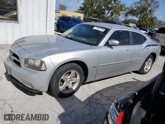 2010 Dodge Charger SXT с VIN 2B3CA3CV9AH107260, выставлен на аукционе Copart как лот 77408734 с пробегом Не указан миль и Списание • Salvage title. История ставок и продаж доступна на DreamBid. Изображение 1.