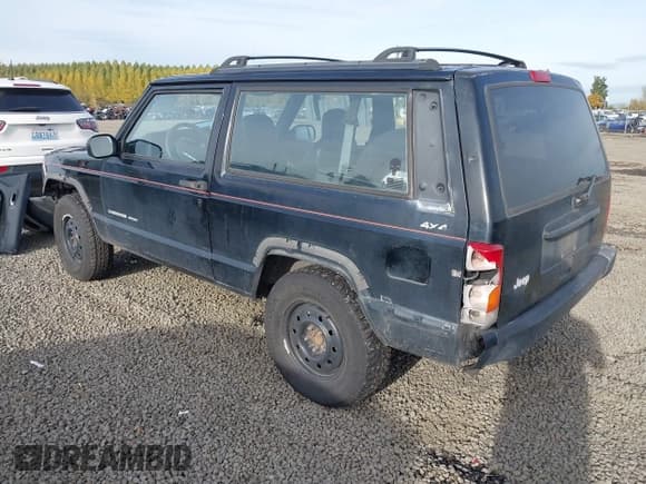 ✅ 1999 Jeep Cherokee Sport • VIN: 1J4FF67S3XL542845 • Lot: 43576296. Listed on IAAI with 248,139 mi. Free auction sales archive from the USA and detailed vehicle history report at DreamBid. Image 3.