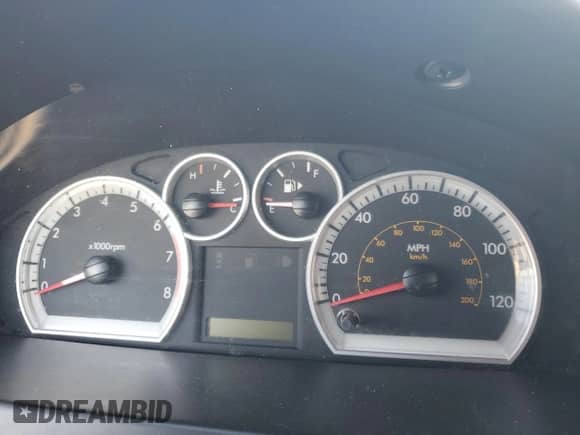 2007 Chevrolet Aveo LS z VIN KL1TD56697B146302, wystawiony jako Copart lot #83475204 z przebiegiem Nie podano mil oraz Szkoda całkowita • Salvage title. Historia ofert i sprzedaży dostępna na DreamBid. Obrazek 9.