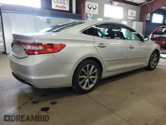 2016 Hyundai Azera z VIN KMHFG4JG1GA506784, wystawiony jako Copart lot #84911744 z przebiegiem 88 057 mil mil oraz Szkoda całkowita • Salvage title. Historia ofert i sprzedaży dostępna na DreamBid. Obrazek 3.