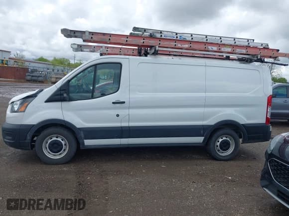 ✅ 2021 Ford Transit Cargo • VIN: 1FTYE1Y86MKA71783 • Lot: 42183454. Listed on IAAI with 53,405 mi. Free auction sales archive from the USA and detailed vehicle history report at DreamBid. Image 14.