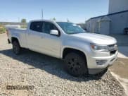 ✅ 2020 Chevrolet Colorado 4WD LT • VIN: 1GCGTCEN0L1100271 • Lot: 57789545. Wystawiony na Copart z przebiegiem 127 671 mil. Bezpłatny archiwum sprzedaży aukcyjnych z USA i szczegółowy raport historii pojazdu na DreamBid. Zdjęcie 13.