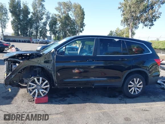✅ 2019 Honda Pilot EX-L • VIN: 5FNYF5H58KB044315 • Lot: 43127518. Listed on IAAI with 63,216 mi. Free auction sales archive from the USA and detailed vehicle history report at DreamBid. Image 15.