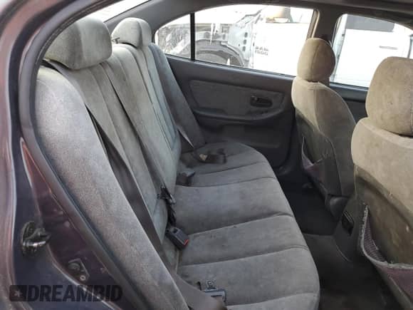 2003 Hyundai Elantra GLS z VIN KMHDN45D53U572664, wystawiony jako Copart lot #82387214 z przebiegiem Nie podano mil oraz Szkoda całkowita • Salvage title. Historia ofert i sprzedaży dostępna na DreamBid. Obrazek 10.