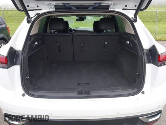 ✅ 2023 Buick Envision Essence • VIN: LRBFZNR41PD063516 • Lot: 42418125. Listed on IAAI with 36,749 mi. Free auction sales archive from the USA and detailed vehicle history report at DreamBid. Image 17.