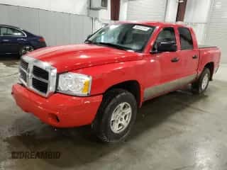 2006 Dodge Dakota SLT с VIN 1D7HW48N76S589897, выставлен на аукционе Copart как лот 80532214 с пробегом 139 395 миль миль и Списание • Salvage title. История ставок и продаж доступна на DreamBid. Изображение 1.