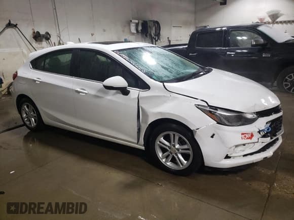 ✅ 2017 Chevrolet Cruze LT • VIN: 3G1BE6SMXHS548792 • Lot: 71557962. Listed on Copart with 104,687 mi. Free auction sales archive from the USA and detailed vehicle history report at DreamBid. Image 4.