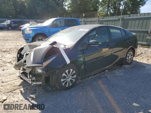 2022 Toyota Prius LE with VIN JTDL9MFU8N3031409, listed as a Copart auction lot 64952955 with 94,176 mi miles and Salvage title. Bid and sale history available at DreamBid. Image 1.