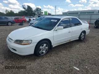 1999 Honda Accord EX with VIN 1HGCG1653XA013722, listed as a Copart auction lot 71023805 with 217,852 mi miles and Salvage title. Bid and sale history available at DreamBid. Image 1.