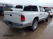 ✅ 2002 Dodge Dakota SLT • VIN: 1B7HL48X52S549395 • Lot: 41831931. Wystawiony na IAAI z przebiegiem 231 897 mil. Bezpłatny archiwum sprzedaży aukcyjnych z USA i szczegółowy raport historii pojazdu na DreamBid. Zdjęcie 4.