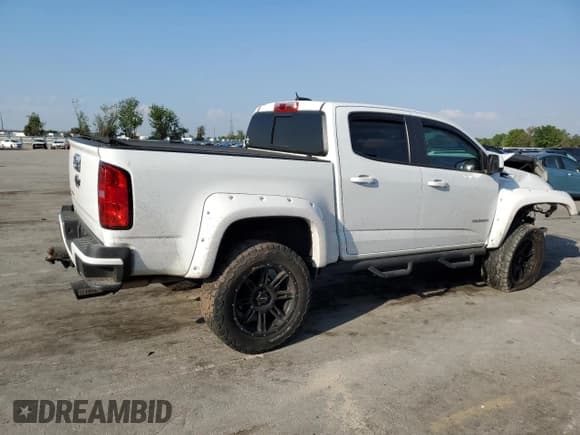 ✅ 2018 Chevrolet Colorado 4WD Z71 • VIN: 1GCGTDENXJ1306345 • Лот: 43760073. Опубликован ранее на Copart с пробегом 60 051 миль. Бесплатный доступ к архиву аукционных продаж из США и подробный отчёт об истории автомобиля на DreamBid. Изображение 3.