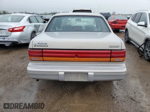✅ 1993 Dodge Spirit • VIN: 3B3XA4632PT520185 • Lot: 54891565. Listed on Copart with 125,574 mi. Free auction sales archive from the USA and detailed vehicle history report at DreamBid. Image 6.