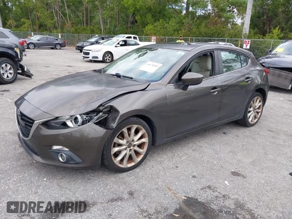✅ 2015 Mazda 3 S Grand Touring • VIN: JM1BM1M35F1264244 • Lot: 41674683. Listed on IAAI with 119,684 mi. Free auction sales archive from the USA and detailed vehicle history report at DreamBid. Image 17.