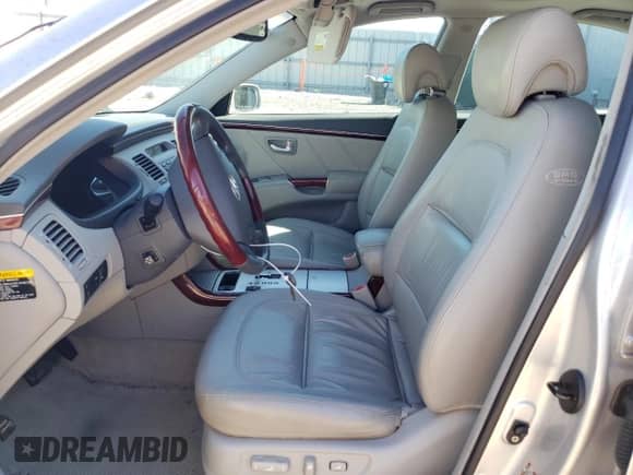 2006 Hyundai Azera SE с VIN KMHFC46F06A131299, выставлен на аукционе Copart как лот 45577255 с пробегом 67 847 миль миль и Списание • Salvage title. История ставок и продаж доступна на DreamBid. Изображение 7.