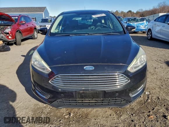 ✅ 2015 Ford Focus Titanium • VIN: 1FADP3N27FL235033 • Lot: 95573645. Wystawiony na Copart z przebiegiem 158 138 mil. Bezpłatny archiwum sprzedaży aukcyjnych z USA i szczegółowy raport historii pojazdu na DreamBid. Zdjęcie 5.
