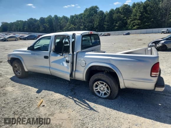 ✅ 2003 Dodge Dakota Sport • VIN: 1D7HL38X23S228612 • Lot: 80368195. Wystawiony na Copart z przebiegiem Nie podano. Bezpłatny archiwum sprzedaży aukcyjnych z USA i szczegółowy raport historii pojazdu na DreamBid. Zdjęcie 2.