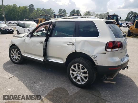 ✅ 2010 Volkswagen Touareg V6 • VIN: WVGFK7A96AD004117 • Lot: 66551005. Listed on Copart with 99,436 mi. Free auction sales archive from the USA and detailed vehicle history report at DreamBid. Image 2.