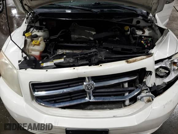 2010 Dodge Caliber Mainstreet с VIN 1B3CB3HA0AD542572, выставлен на аукционе Copart как лот 72781434 с пробегом 144 032 миль миль и Списание • Salvage title. История ставок и продаж доступна на DreamBid. Изображение 12.