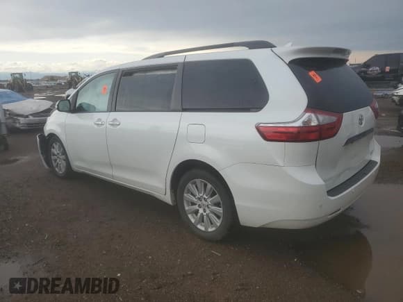 ✅ 2015 Toyota Sienna Limited • VIN: 5TDDK3DC0FS101949 • Lot: 61479235. Listed on Copart with 100,898 mi. Free auction sales archive from the USA and detailed vehicle history report at DreamBid. Image 2.