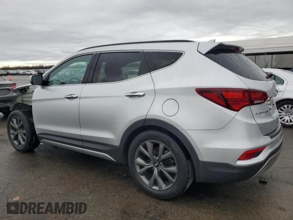 ✅ 2018 Hyundai Santa Fe Ultimate • VIN: 5XYZW4LA2JG507009 • Лот: 38081144. Опубликован ранее на Copart с пробегом 54 255 миль. Бесплатный доступ к архиву аукционных продаж из США и подробный отчёт об истории автомобиля на DreamBid. Изображение 2.