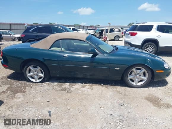 ✅ 1998 Jaguar XK • VIN: SAJGX2240WC027066 • Lot: 42754641. Listed on IAAI with 111,533 mi. Free auction sales archive from the USA and detailed vehicle history report at DreamBid. Image 13.