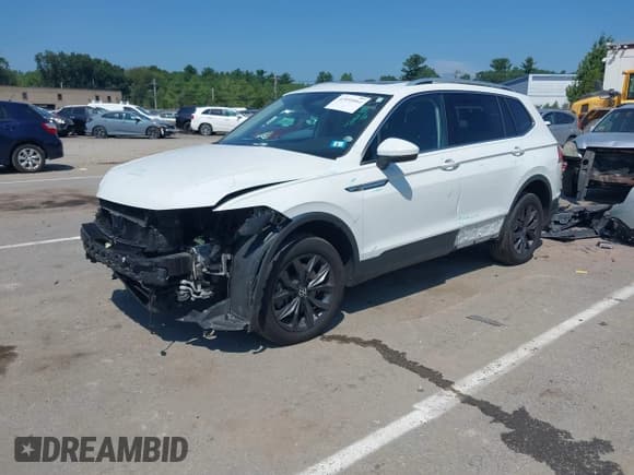 ✅ 2022 Volkswagen Tiguan SE • VIN: 3VV2B7AX2NM096940 • Lot: 42850064. Wystawiony na IAAI z przebiegiem 52 304 mil. Bezpłatny archiwum sprzedaży aukcyjnych z USA i szczegółowy raport historii pojazdu na DreamBid. Zdjęcie 18.