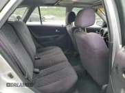 ✅ 2003 Mazda Protege • VIN: JM1BJ245131200147 • Lot: 62848564. Listed on Copart with 141,556 mi. Free auction sales archive from the USA and detailed vehicle history report at DreamBid. Image 10.