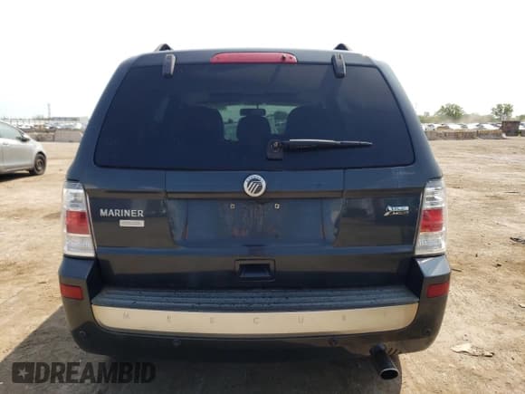 ✅ 2010 Mercury Mariner Premier • VIN: 4M2CN9HG7AKJ26845 • Lot: 66954244. Wystawiony na Copart z przebiegiem 168 204 mil. Bezpłatny archiwum sprzedaży aukcyjnych z USA i szczegółowy raport historii pojazdu na DreamBid. Zdjęcie 6.