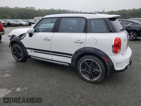 ✅ 2015 MINI Countryman S • VIN: WMWZC5C53FWP48490 • Lot: 81062595. Listed on Copart with 71,414 mi. Free auction sales archive from the USA and detailed vehicle history report at DreamBid. Image 2.