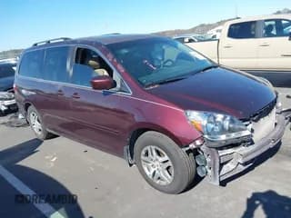 ✅ 2007 Honda Odyssey EX-L • VIN: 5FNRL38717B090613 • Lot: 43675104. Listed on IAAI with 208,065 mi. Free auction sales archive from the USA and detailed vehicle history report at DreamBid. Image 1.