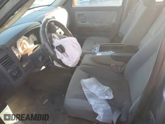 2005 Dodge Dakota SLT с VIN 1D7HW42N05S315223, выставлен на аукционе Copart как лот 71559234 с пробегом 127 204 миль миль и Списание • Salvage title. История ставок и продаж доступна на DreamBid. Изображение 7.