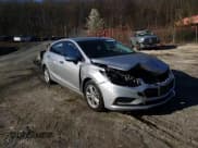 ✅ 2018 Chevrolet Cruze LT • VIN: 3G1BE6SM9JS652079 • Lot: 46749163. Listed on Copart with 88,068 mi. Free auction sales archive from the USA and detailed vehicle history report at DreamBid. Image 11.