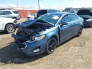 ✅ 2019 Ford Fusion SE • VIN: 3FA6P0HD9KR231582 • Лот: 43257640. Опубликован ранее на IAAI с пробегом 84 431 миль. Бесплатный доступ к архиву аукционных продаж из США и подробный отчёт об истории автомобиля на DreamBid. Изображение 2.