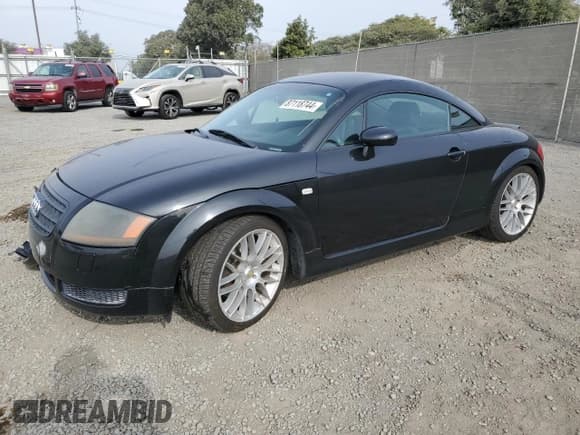 ✅ 2003 Audi TT • VIN: TRUWT28N131019058 • Lot: 87118744. Listed on Copart with 164,154 mi. Free auction sales archive from the USA and detailed vehicle history report at DreamBid. Image 1.