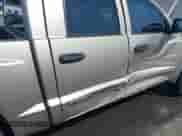 2005 Dodge Dakota Laramie with VIN 1D7HE58N65S128701, listed as a IAAI auction lot 42612813 with 133,800 mi miles and . Bid and sale history available at DreamBid. Image 6.