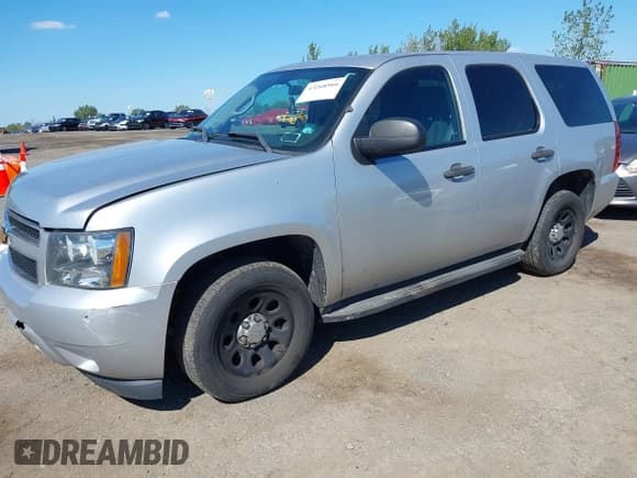 ✅ 2014 Chevrolet Tahoe Commercial • VIN: 1GNLC2E09ER207067 • Lot: 43268966. Listed on IAAI with 227,117 mi. Free auction sales archive from the USA and detailed vehicle history report at DreamBid. Image 2.