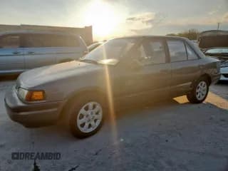 ✅ 1994 Mazda Protege • VIN: JM1BG2265R0782553 • Lot: 69733705. Wystawiony na Copart z przebiegiem 332 290 mil. Bezpłatny archiwum sprzedaży aukcyjnych z USA i szczegółowy raport historii pojazdu na DreamBid. Zdjęcie 1.