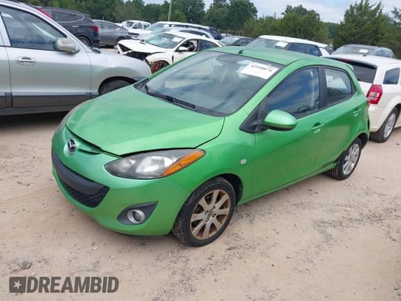 ✅ 2013 Mazda 2 Touring • VIN: JM1DE1LY7D0161090 • Lot: 42998876. Listed on IAAI with 154,652 mi. Free auction sales archive from the USA and detailed vehicle history report at DreamBid. Image 2.
