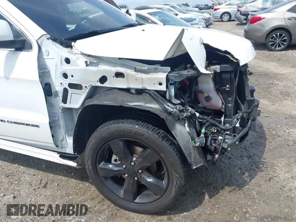 ✅ 2015 Jeep Grand Cherokee Overland • VIN: 1C4RJFCG7FC174719 • Лот: 42076540. Опубликован ранее на IAAI с пробегом 160 856 миль. Бесплатный доступ к архиву аукционных продаж из США и подробный отчёт об истории автомобиля на DreamBid. Изображение 18.