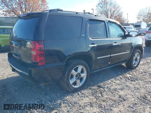✅ 2010 Chevrolet Tahoe LTZ • VIN: 1GNUKCE00AR102375 • Lot: 43576742. Listed on IAAI with Not provided. Free auction sales archive from the USA and detailed vehicle history report at DreamBid. Image 4.