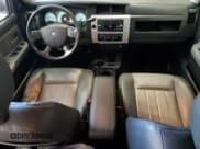 ✅ 2008 Dodge Dakota Laramie • VIN: 1D7HW58N98S599551 • Lot: 85739785. Wystawiony na Copart z przebiegiem 84 020 mil. Bezpłatny archiwum sprzedaży aukcyjnych z USA i szczegółowy raport historii pojazdu na DreamBid. Zdjęcie 8.