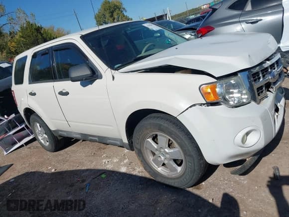 ✅ 2009 Ford Escape XLS • VIN: 1FMCU02789KD04279 • Lot: 43502857. Listed on IAAI with 84,804 mi. Free auction sales archive from the USA and detailed vehicle history report at DreamBid. Image 13.