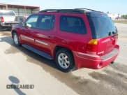 ✅ 2003 GMC Envoy SLE • VIN: 1GKET16S636122380 • Lot: 42618528. Listed on IAAI with 219,271 mi. Free auction sales archive from the USA and detailed vehicle history report at DreamBid. Image 3.
